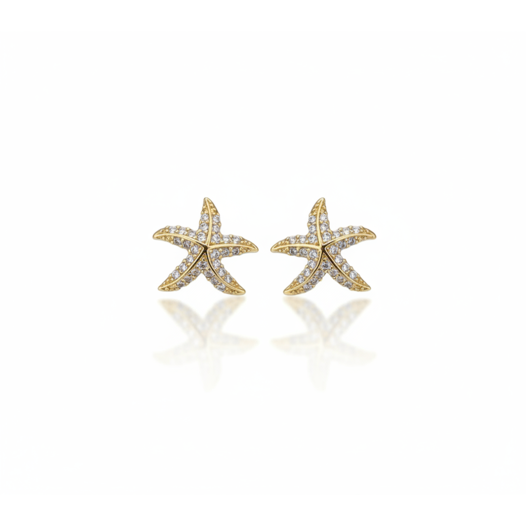 Brinco estrela do mar cravejada com zirconia lado